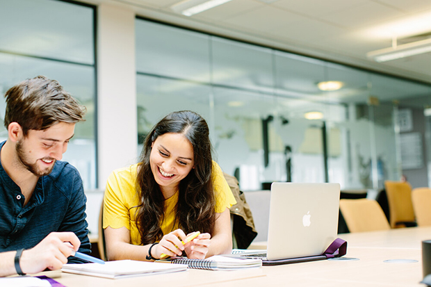 Students study together in the library - University of Leeds