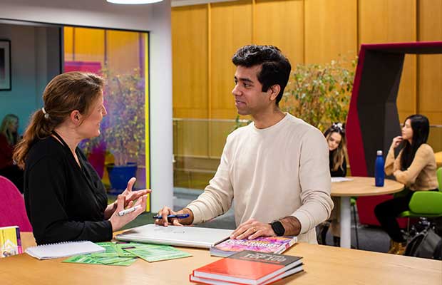 University of Plymouth - 2 people at desk