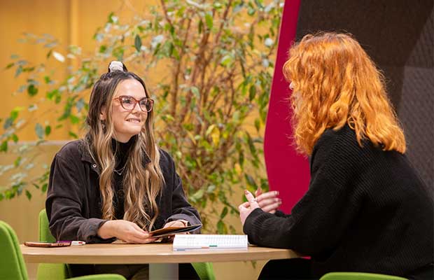 University of Plymouth - 2 people at desk