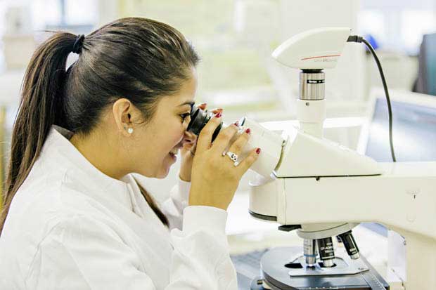 University of Westminster - girl at microscope