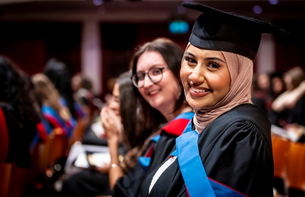 University of Leicester - Graduating student smiling