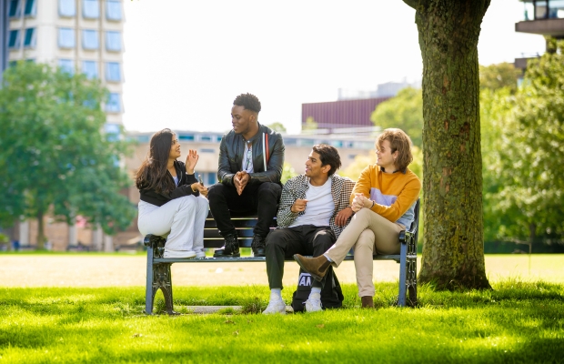 University of Leicester - 4 students on a bench