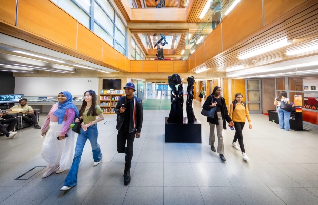 University of Leicester - Students walking through a university building